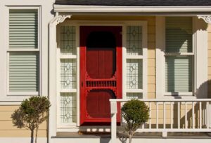 Exterior view of red front door on home